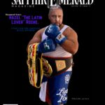 Boxer proudly posing with championship belts on magazine cover.