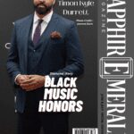 A well-dressed man poses on Sapphire Emerald Magazine cover for Black Music Honors.